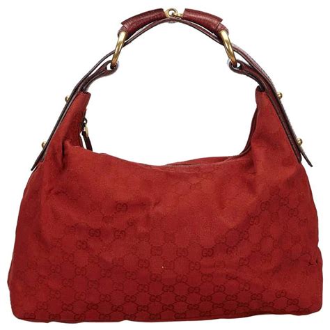 red gucci bag used